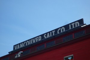 The Vancouver Salt Co. Ltd Sign on top of the red salt building in Southeast False Creek
